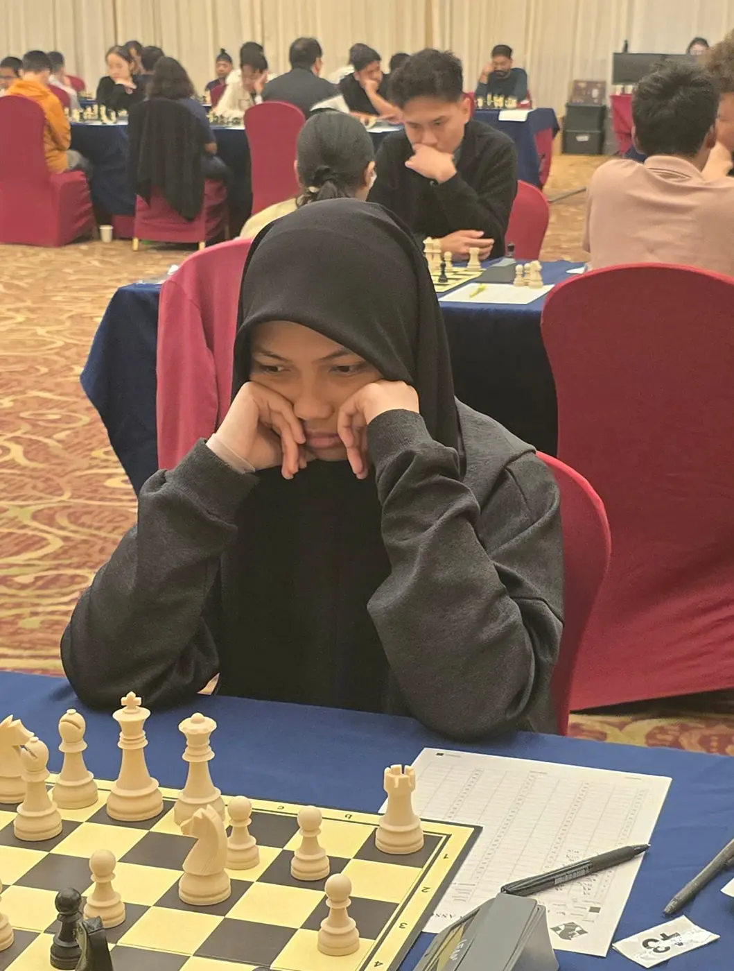 Tournament participant competing at the 1st Berjaya Global Chess Open 2026 — photo 7