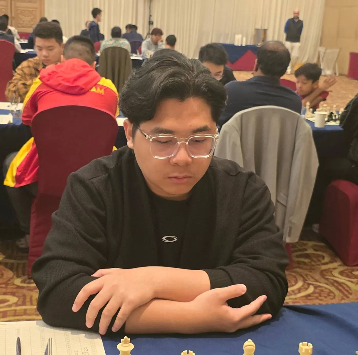 Tournament participant competing at the 1st Berjaya Global Chess Open 2026 — photo 8
