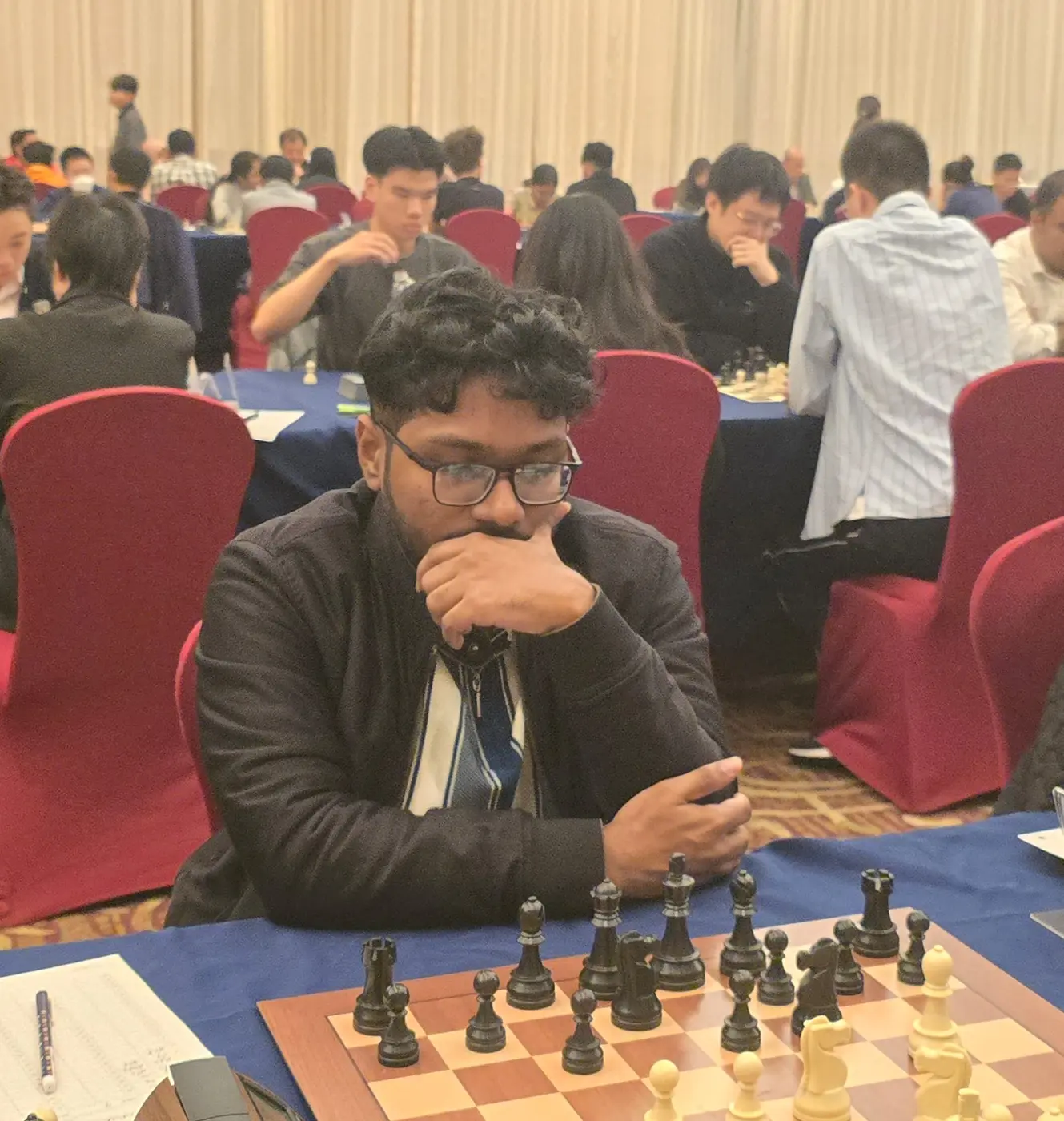 Tournament participant competing at the 1st Berjaya Global Chess Open 2026 — photo 41