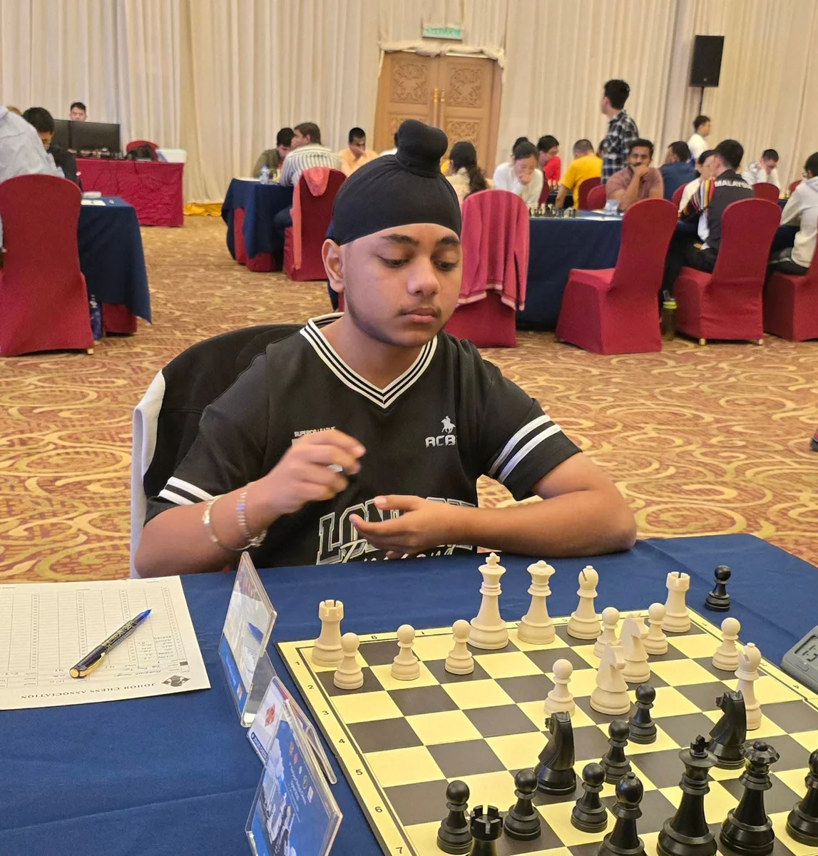 Player in concentration at the 1st Berjaya Global Chess Open 2026